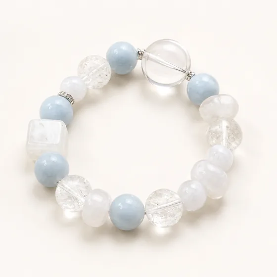 Aquamarine and clear quartz with a white freeform, spaced with silver.